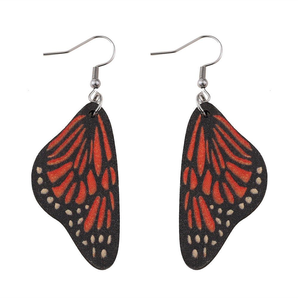 Alas de mariposa al por mayor Pendientes de madera de doble cara